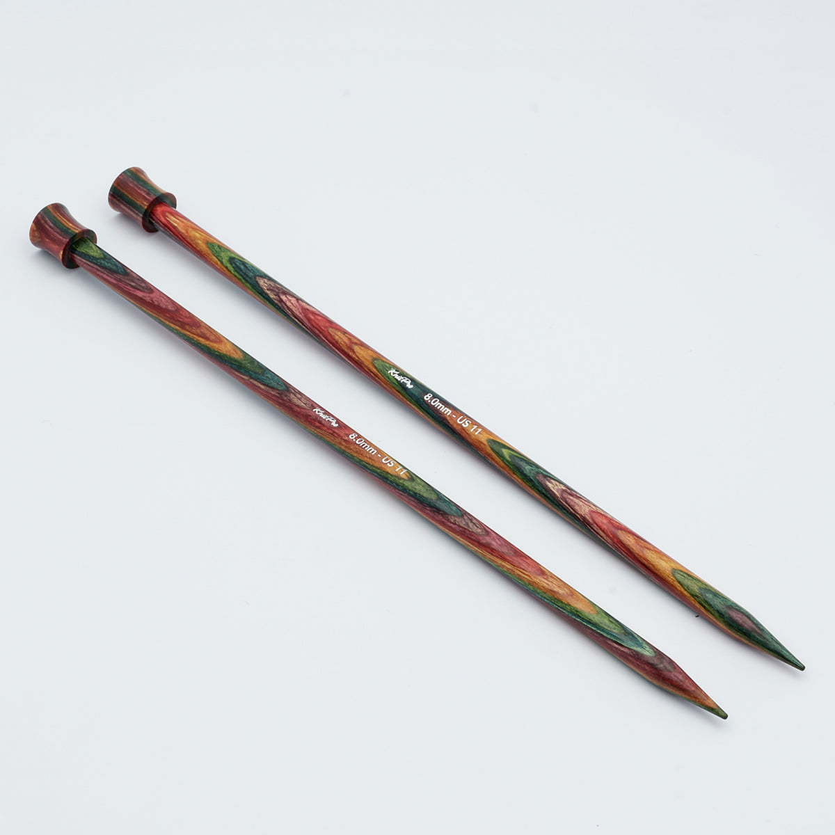 TKnitPro Symfonie 2 single pointed knitting needles, 35 cm - wo wooden knitting needles with a colorful marbled pattern of red, green, orange, and brown, photographed on a clean white background.