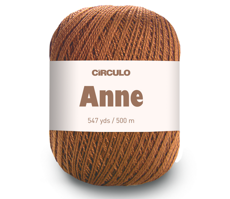 A single ball of yarn Circulo ANNE - 100% mercerized Cotton Yarn, 500m / 147g - wrapped with a white paper label. The yarn is a warm, heathered medium brown color, and the background is a clean white studio setting.